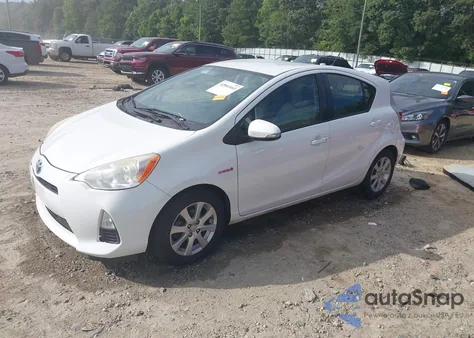 2012 Toyota Prius C One from USA, damaged, VIN JTDKDTB35C1511711